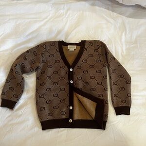 Authentic Gucci buttoned cardigan. 3-5 years old. Missing button.